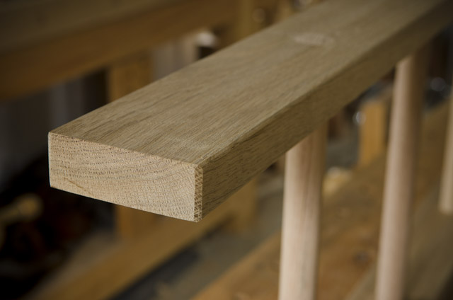 Wooden oak ladder on a woodworking workbench for ladder making class