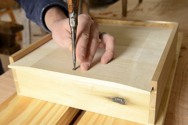 Adding a screw to a drawer bottom woodworking plans